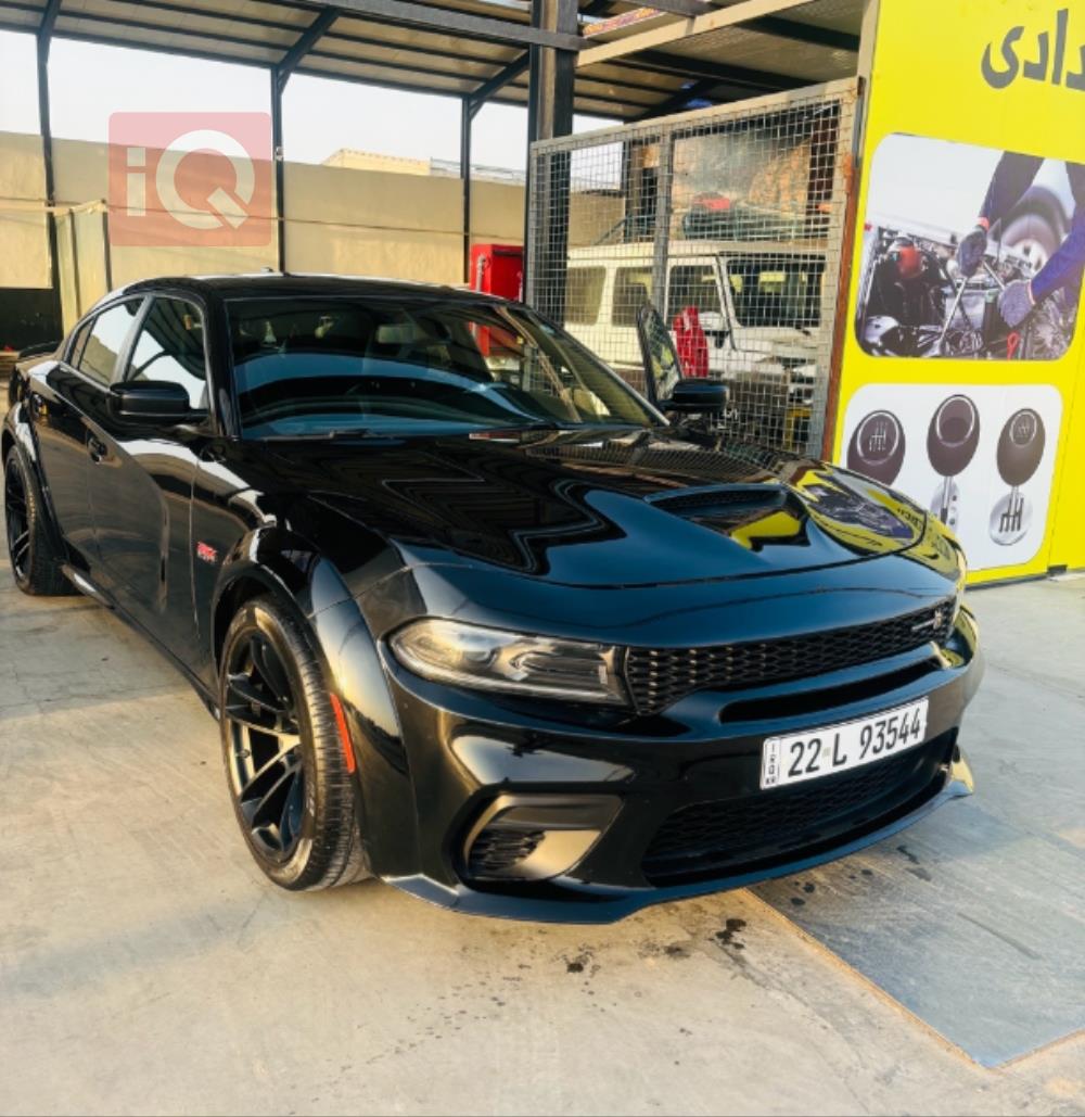 دۆج چارجەر